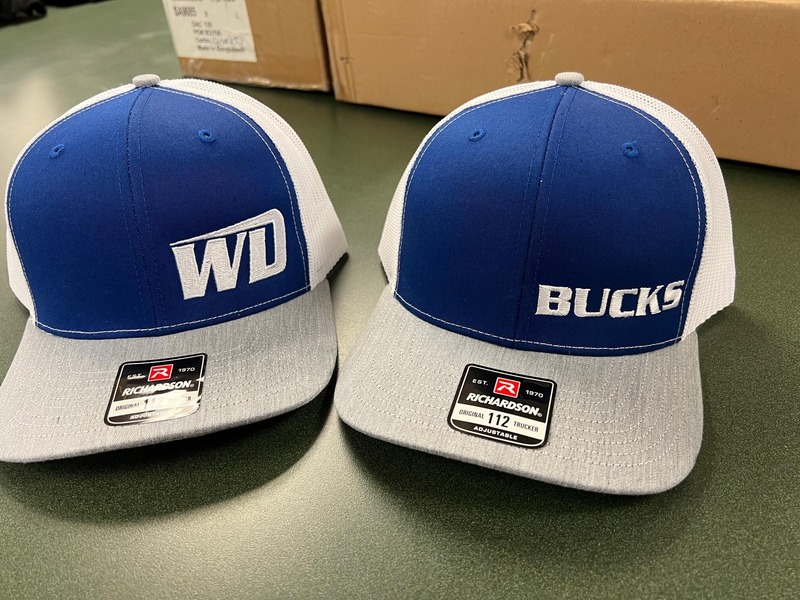 Embroidered logo in a blue Hats