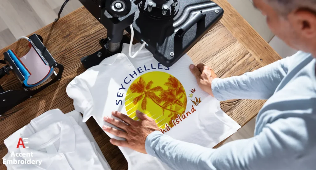 A man at a sewing machine works on making a t shirt, illustrating custom t shirt printing in action A man at a sewing machine works on making a t shirt, illustrating custom t shirt printing in action