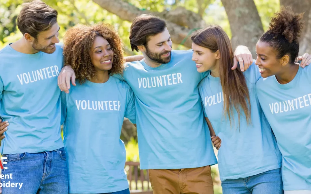 A variety of volunteer t shirts in different colors and styles, ready for custom printing for events and team activities